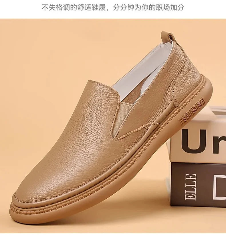 Men's genuine leather casual loafers by TrendLux Wear, breathable slip-on flat shoes in solid color with a sleek, comfortable design.