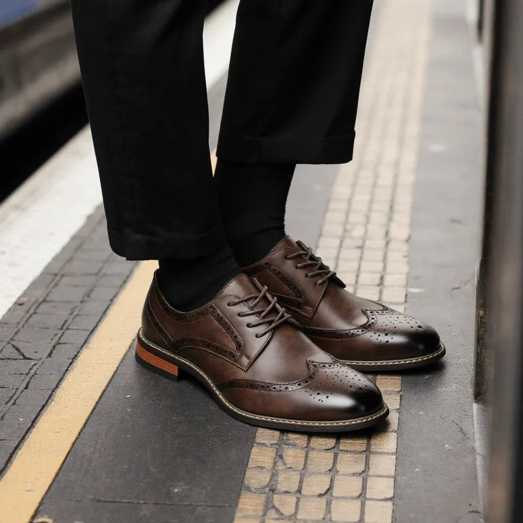 Men's lace-up brogue dress shoes by TrendLux Wear in black and brown leather, formal business Oxfords with decorative perforations.