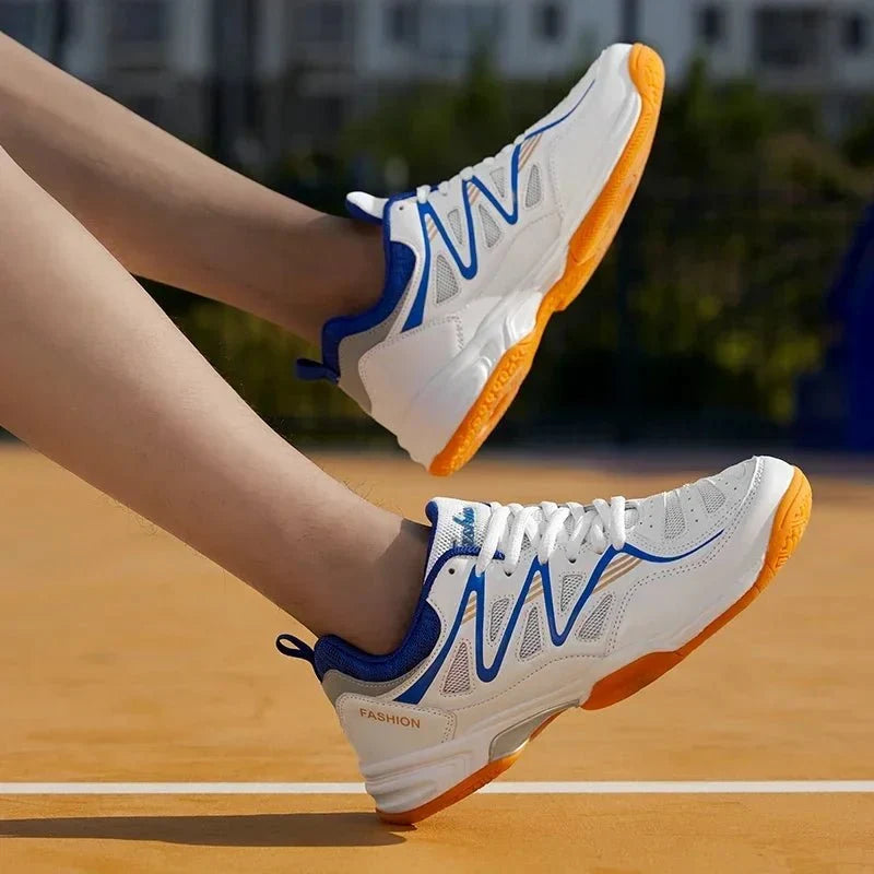 Unisex breathable athletic court sneakers by TrendLux Wear, suitable for tennis and volleyball, in various sizes.