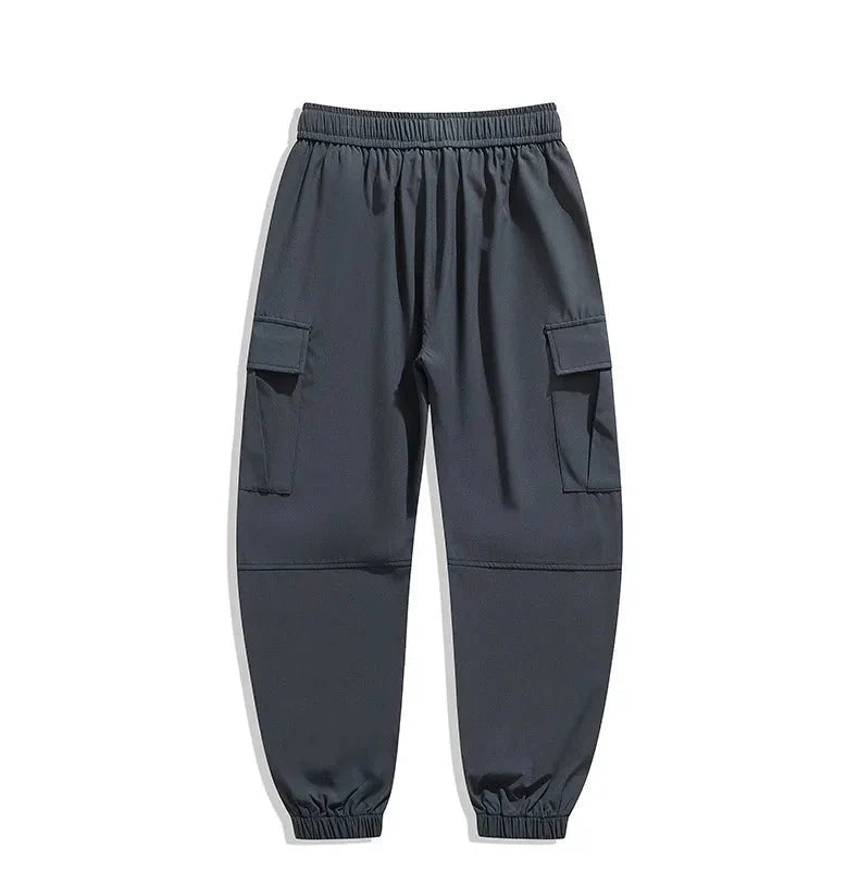 Men's wide leg casual trousers by TrendLux Wear, loose fit multi-pocket pants in six colors, shown in navy with side pockets.
