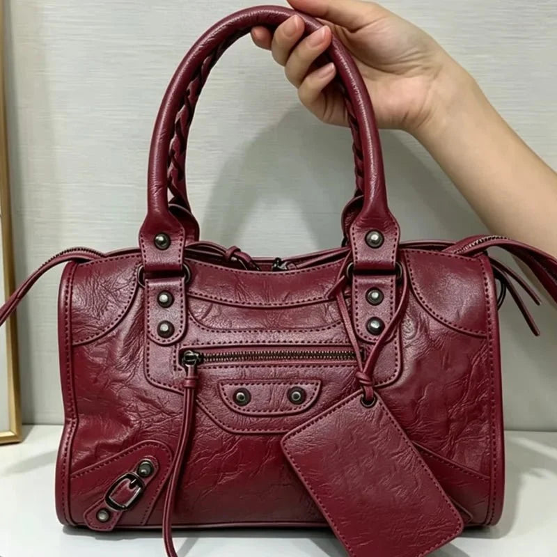 Women's luxury motorcycle hobo handbag by TrendLux Wear, high-capacity leather bag with stylish design and spacious interior.