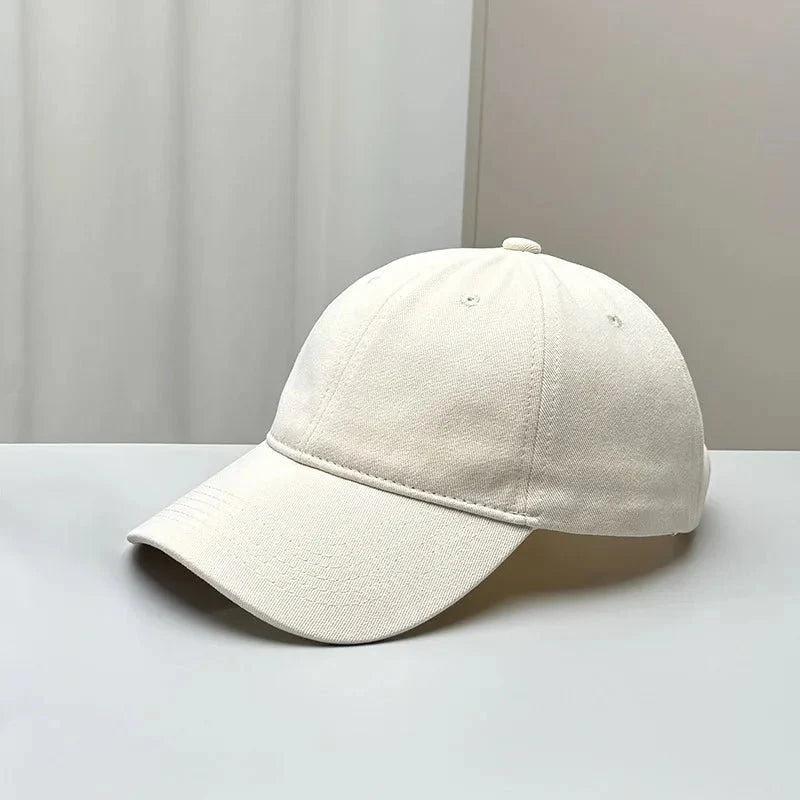 Unisex TrendLux Wear cotton curved brim baseball cap in soft top style, available in 19 colors, Korean fashion-inspired design