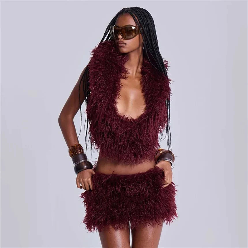 Women's faux fur 2-piece set from TrendLux Wear with lace-up backless tank top and bodycon mini skirt, perfect for night out.