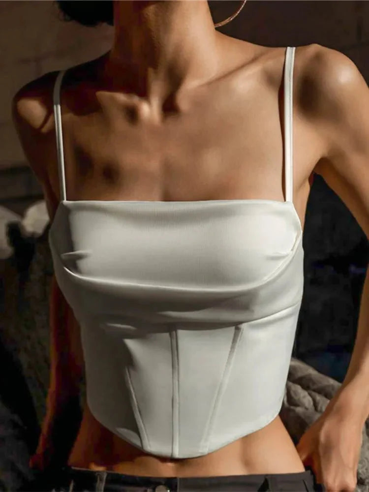 TrenLux Wear women's spaghetti strap tank top featuring a backless bandage design, lace-up detail, and a slim fit for summer streetwear.