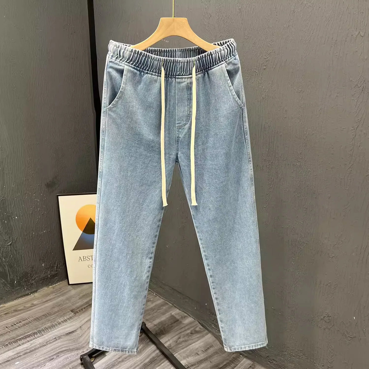 Men's vintage loose straight leg jeans by TrendLux Wear, made of durable cotton denim, suitable for spring and autumn casual wear.