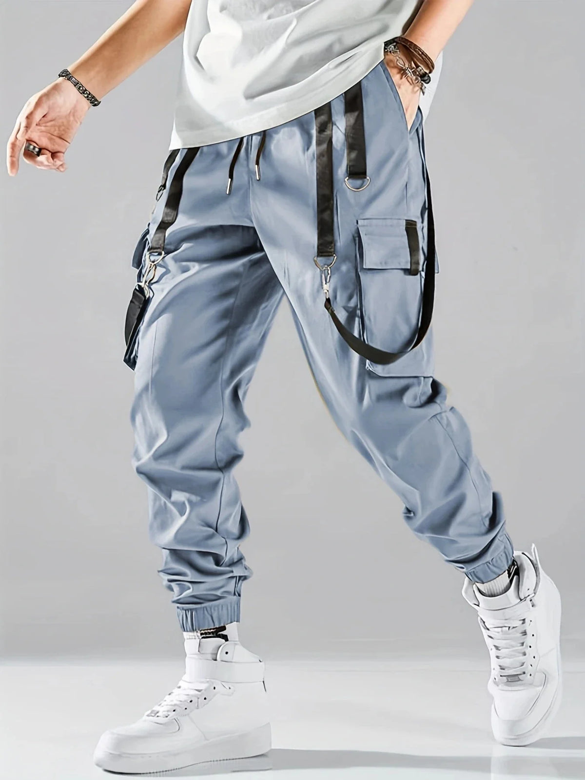 Men's techwear cargo joggers by TrendLux Wear with drawstring, multiple pockets, in 6 colors, styled as hip hop pants.