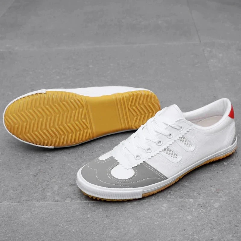 TrendLux Wear professional table tennis shoes with breathable mesh, anti-slip soles, designed for training and competition.