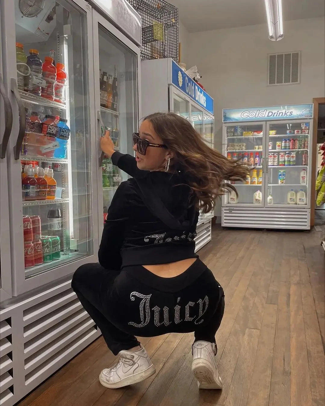 Women's Y2K two-piece hooded tracksuit by TrendLux Wear with long-sleeve jacket and flare jogger pants, in size S–XL.
