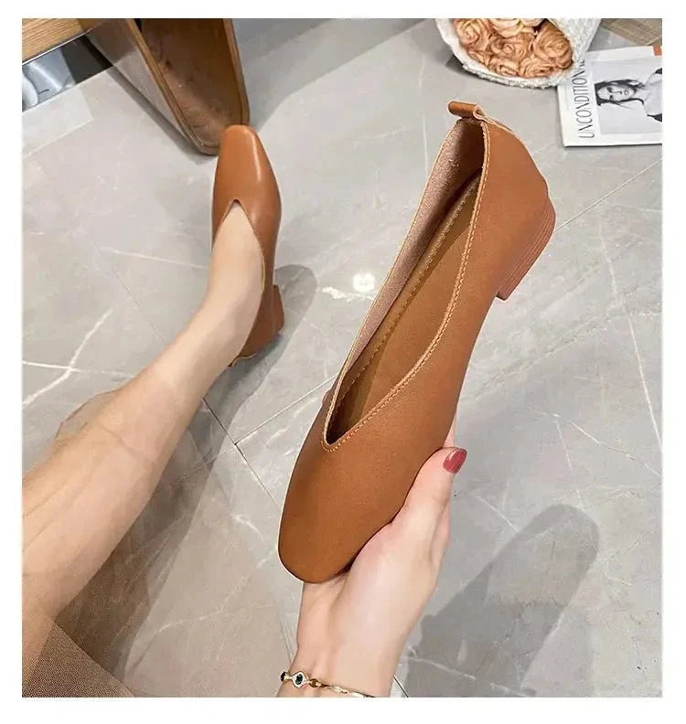 Women's leather loafer flats with round toes from TrendLux Wear, featuring a classic slip-on shoe design.