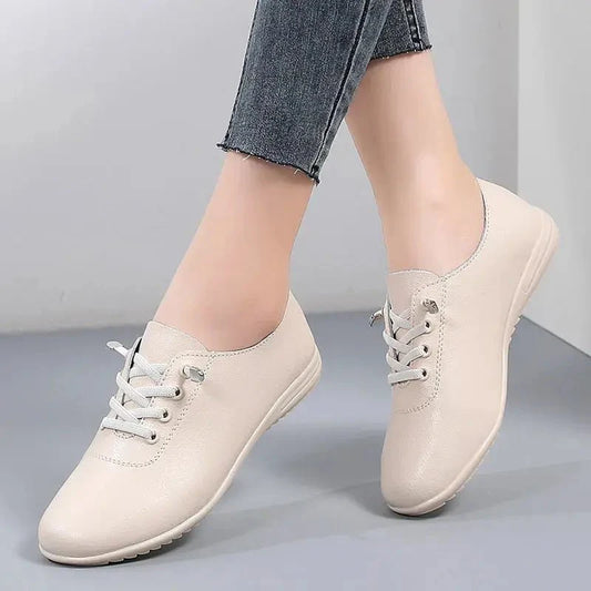 Women's lace-up leather loafers by TrendLux Wear, featuring sleek design and classic style in a stylish shoe image.