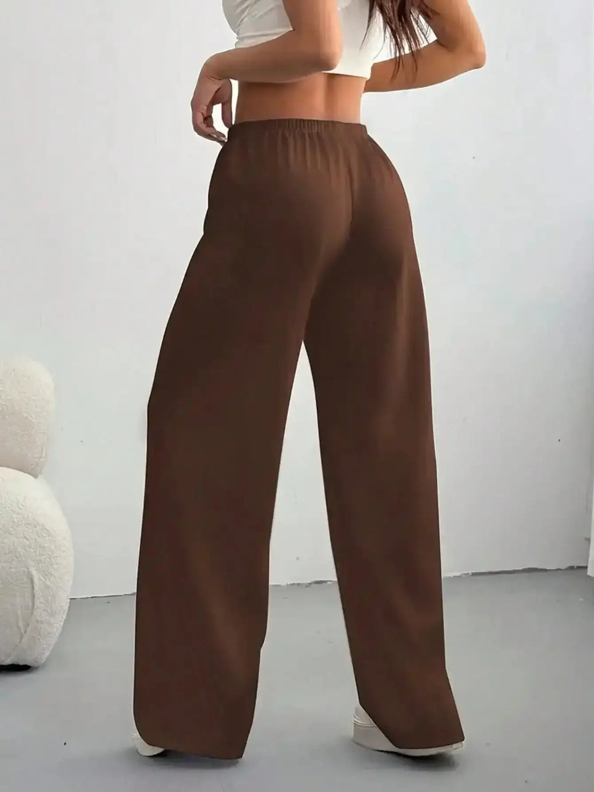 Women wearing TrendLux Wear casual wide-leg jogging pants, comfortable and stylish for everyday wear.