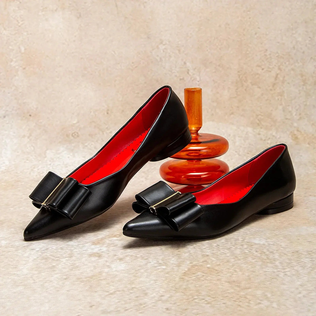 Women's pointed-toe bow flat shoes by TrendLux Wear, featuring a sleek design and comfortable slip-on style.
