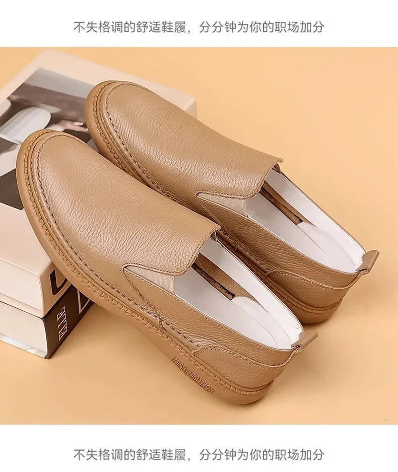 Men's genuine leather casual loafers by TrendLux Wear, breathable slip-on flat shoes in solid color with stylish, comfortable design.