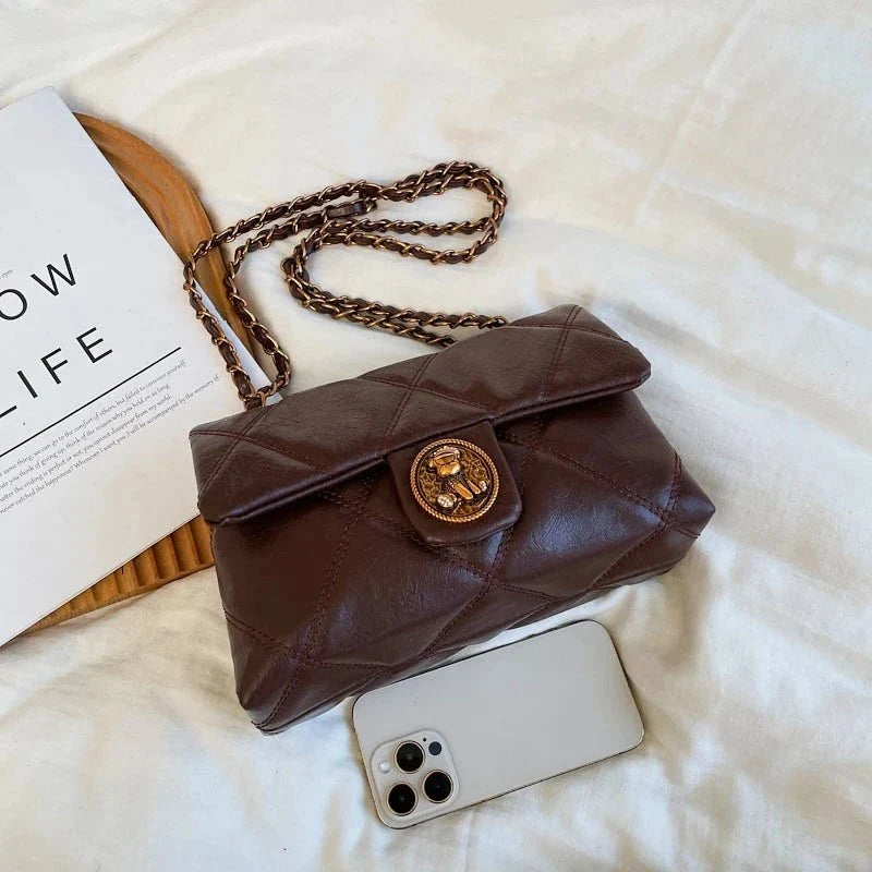 Women's luxury TrendLux Wear leather handbag featuring a lingge pattern, designer style, with elegant pure leather construction.