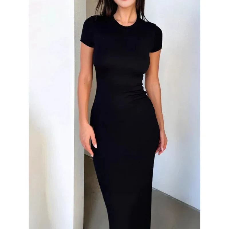 Women's long sleeve dress made of polyester and elastane by The Glow Sanctuary, featuring a fitted, stylish design.