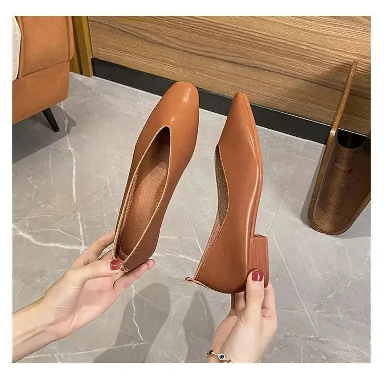 Women's round-toe leather loafer flats by TrendLux Wear, featuring a sleek design and comfortable fit.