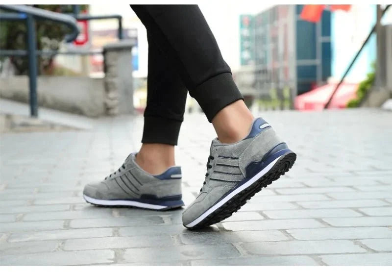 Men's luxury suede running sneakers by TrendLux Wear, breathable and anti-odor sport shoes with stylish design.