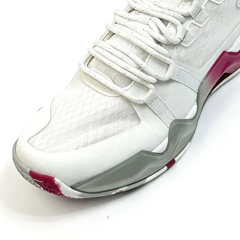 Unisex TrendLux Wear breathable mid-top tennis and badminton shoes with lace-up design, suitable for athletic activities.