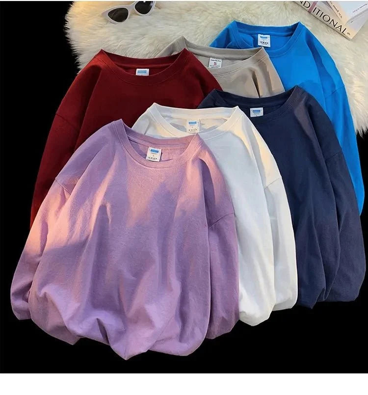 Unisex oversized long sleeve blank T-shirt by My Store 5, in a neutral color, displayed flat with sleeves extended.