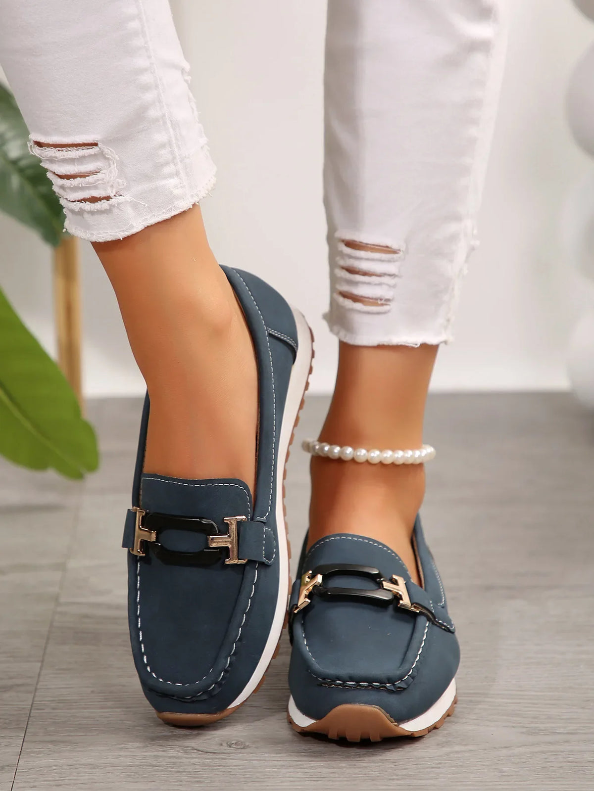 Women’s Slip-On Shoes by TrendLux Wear featuring buckle detail and flat design, perfect for casual or chic everyday wear.