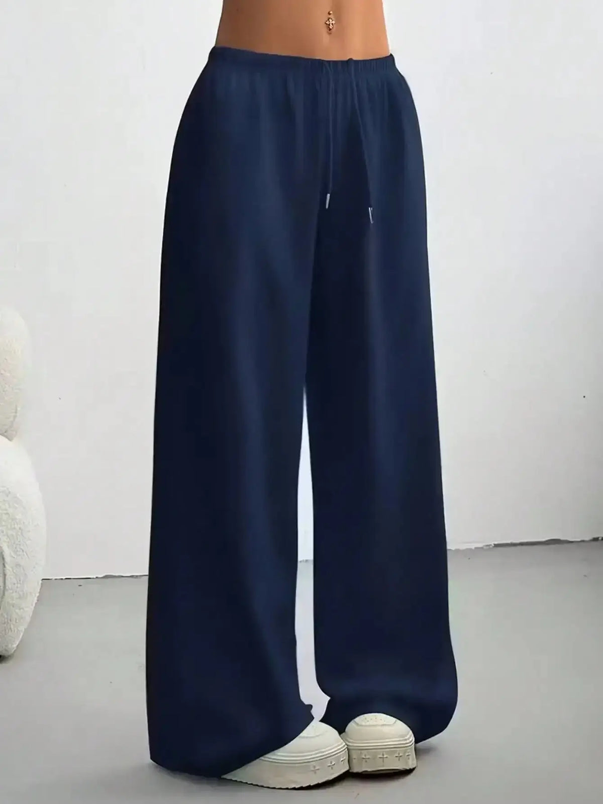 Ladies' casual wide-leg jogging pants by TrendLux Wear, featuring a relaxed fit and comfortable fabric in a stylish design.