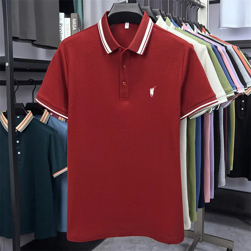 Red short sleeve polo shirt with white and striped collar, featuring a small embroidered logo on the chest.
