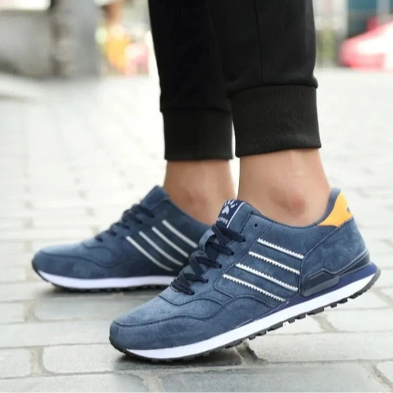 Men's luxury suede running sneakers by TrendLux Wear, breathable anti-odor sport shoes with stylish design and cushioned soles.