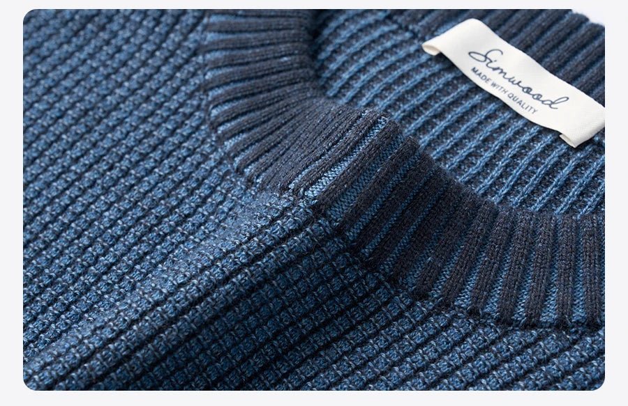 Men's oversized waffle-knit crewneck sweater in Heather Denim Blue by TrendLux Wear, casual pullover with textured knit fabric.