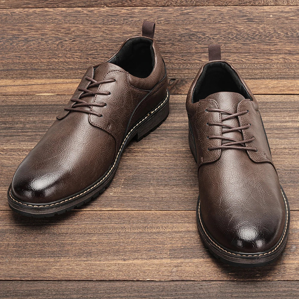Brown leather Derby shoes featuring a round toe and lace-up design, set on a rubber sole with subtle stitching detail.