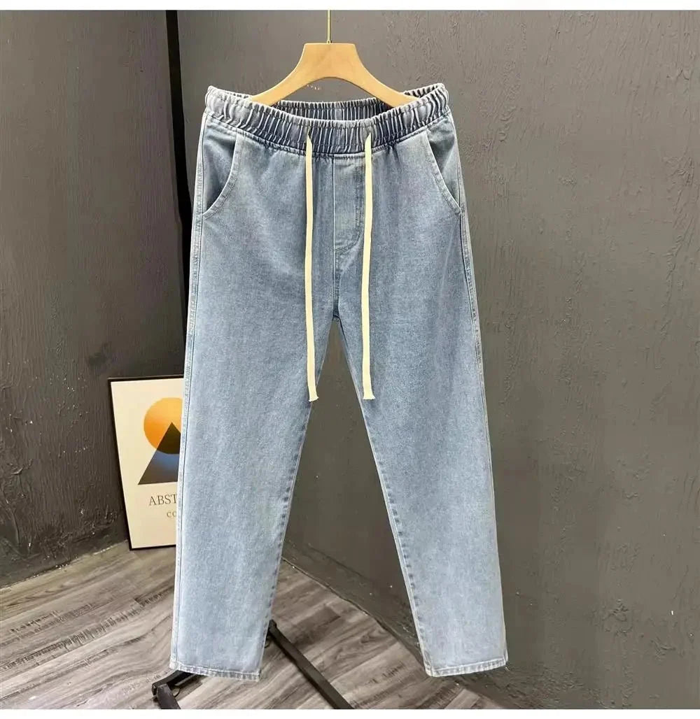 Men's vintage loose straight leg jeans by TrendLux Wear, made of durable cotton denim, casual spring and autumn style.