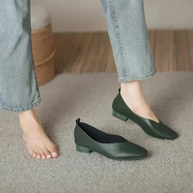 Women's round-toe leather loafer flats by TrendLux Wear, showing the classic design and comfortable fit of the shoes.