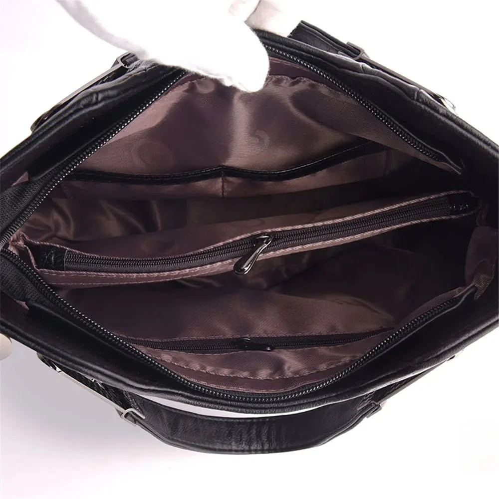 Women's luxury pure leather handbag by TrendLux Wear with multiple pockets, stylish and spacious for everyday use.