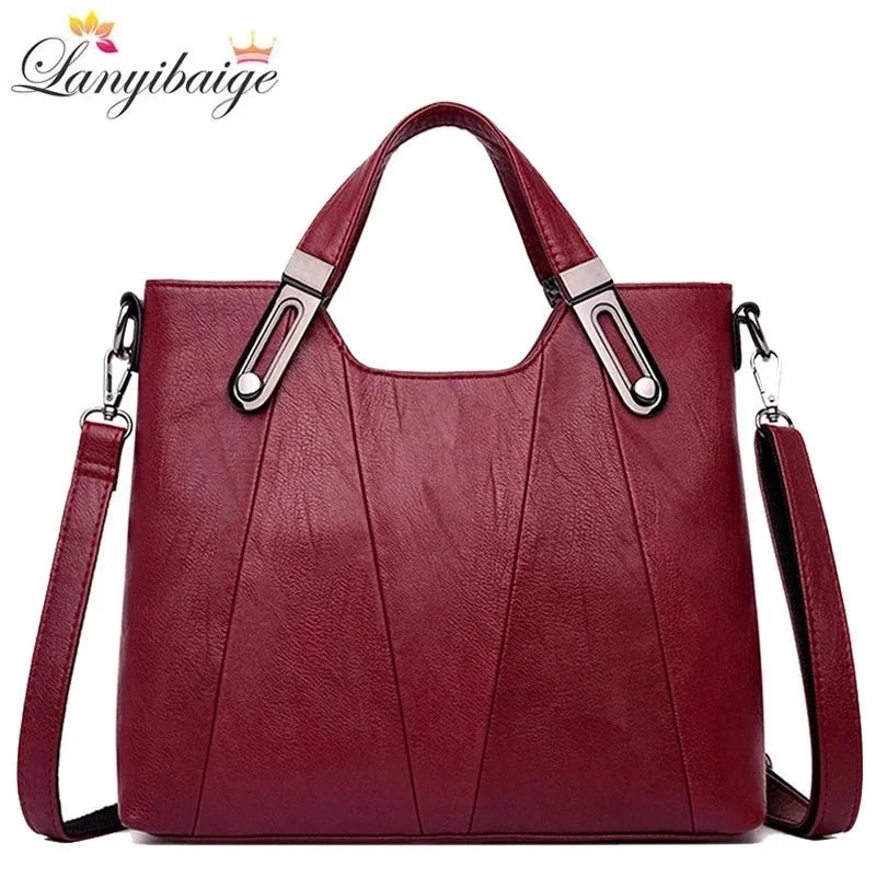 Women's luxury pure leather handbag with multiple pockets by TrendLux Wear, featuring a sleek design and spacious interior.