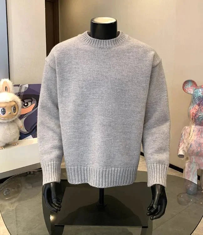 Men's cashmere-blend round neck pullover sweater by TrendLux Wear, shown in a cozy, stylish fit with five color options.