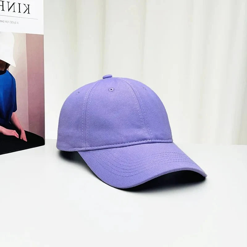 Unisex Korean style baseball cap by TrendLux Wear featuring a high-end cotton fabric and curved brim in various colors.