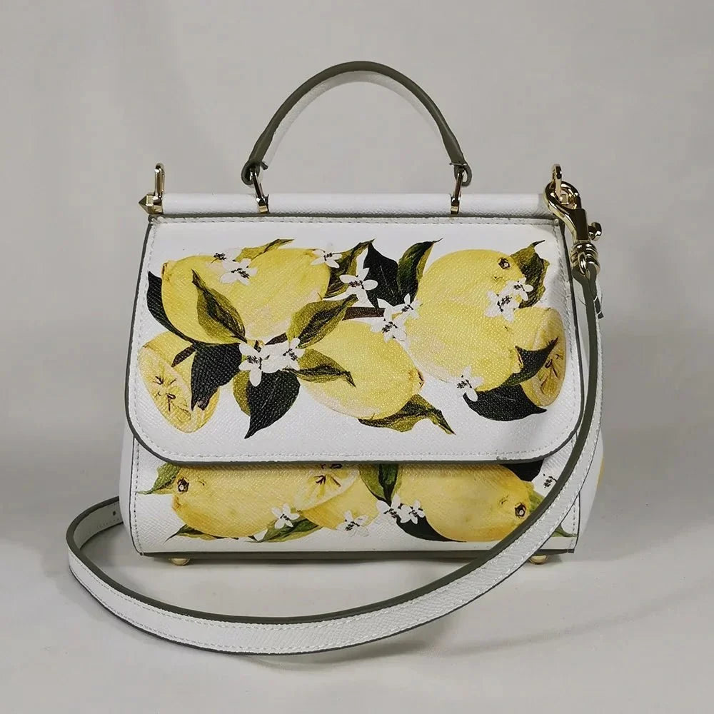 Women's rose pink PU leather crossbody tote handbag with shoulder strap and spacious interior by TrendLux Wear.