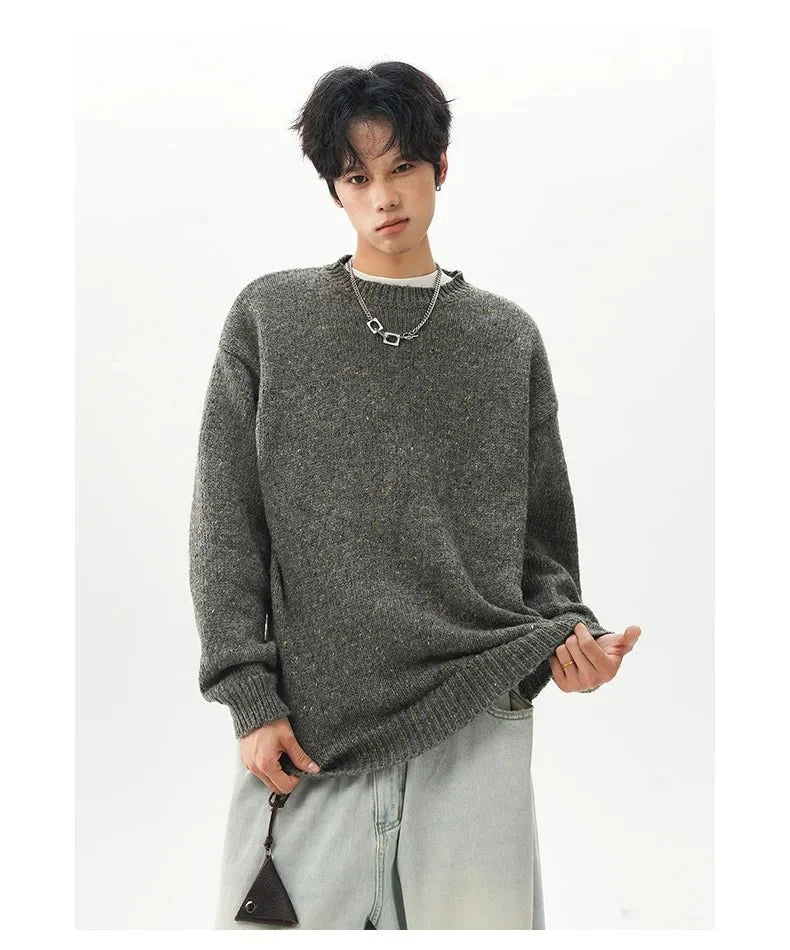 Men's oversized round neck pullover sweater from TrendLux Wear in warm polyester knit, available in three colors.