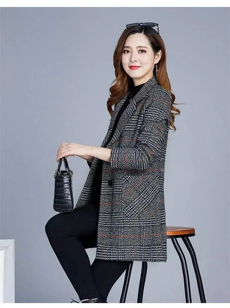 Women’s plaid woolen overcoat by TrendLux Wear, classic plaid pattern, warm wool fabric, stylish outerwear for cold weather.