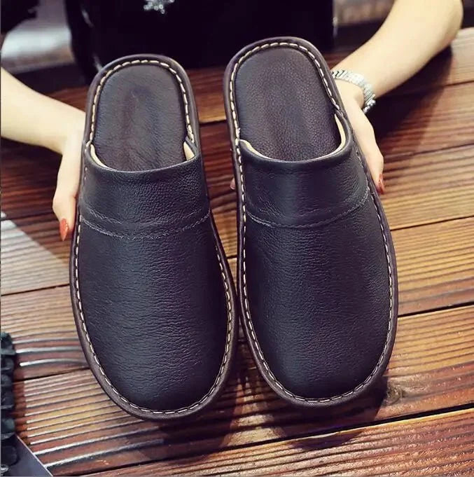 Unisex leather indoor slippers by TrendLux Wear with non-slip soles, available in EU sizes 35-46, designed for comfortable home use.