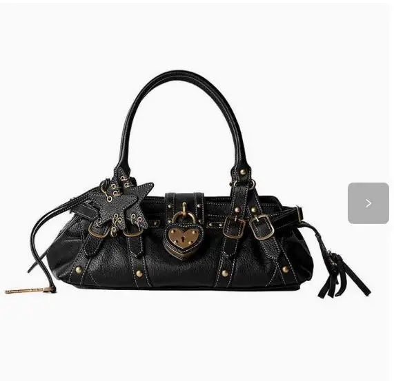 Black crossbody handbag with rivet details, heart-shaped lock, star appliqués, and a single shoulder strap.