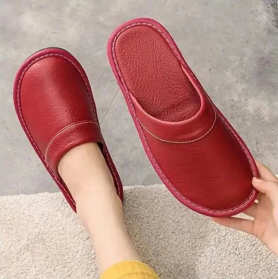 Unisex leather indoor slippers with non-slip soles from TrendLux Wear, available in EU sizes 35 to 46, for comfortable home wear.