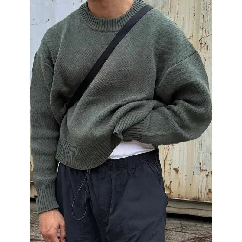 TrendLux Wear minimalist fleece-lined crew neck knit sweater in slim fit, available in four colors, showcasing cozy winter style.