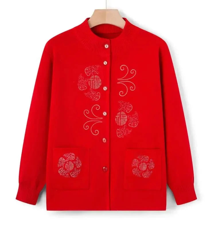 Women's vintage printed knit cardigan coat by TrendLux Wear, featuring colorful patterns and cozy knit fabric.
