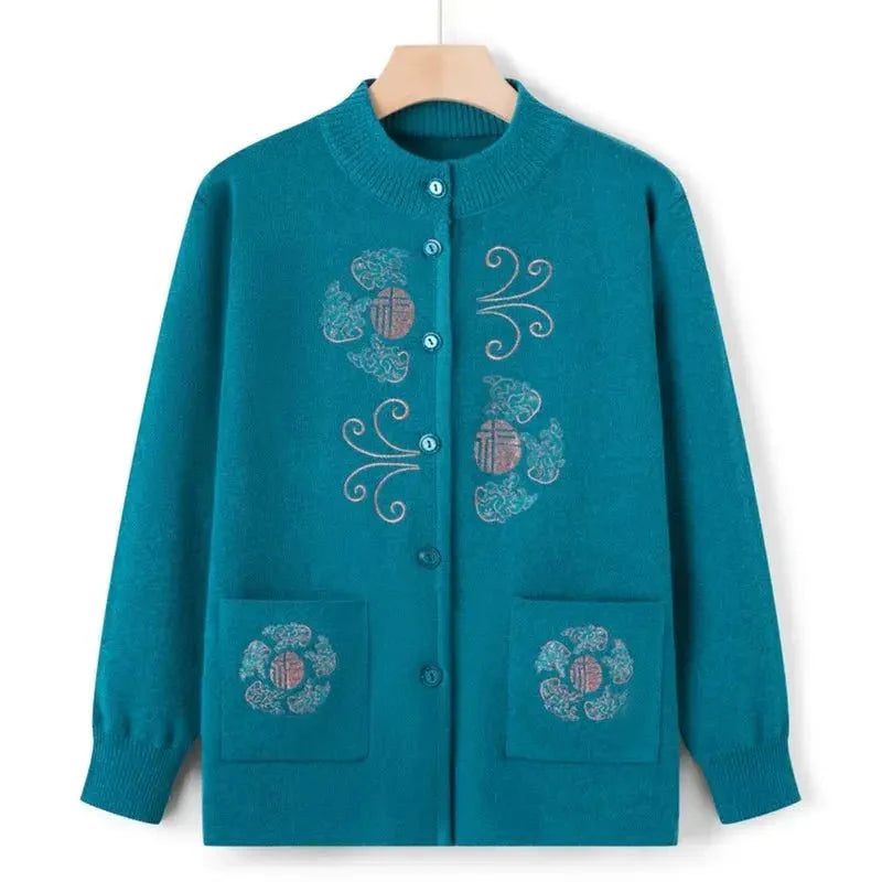 Women's vintage printed knit cardigan coat by TrendLux Wear, featuring colorful patterns and cozy knit fabric.
