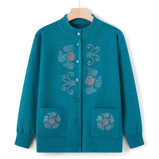 Women's vintage printed knit cardigan coat by TrendLux Wear, featuring colorful patterns and cozy knit fabric.
