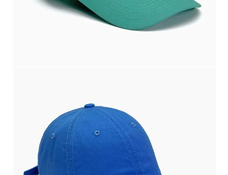 Unisex soft-top dad hat by TrendLux Wear in plain style with sun protection, available in 21 colors, shown in black.