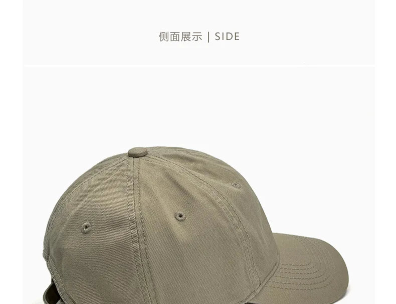 Unisex soft-top dad hat by TrendLux Wear, plain baseball cap with sun protection, available in 21 colors, shown in black.