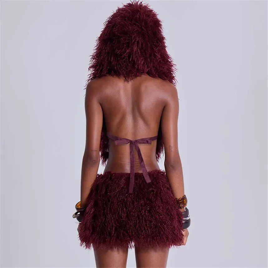 Women's faux fur 2-piece set from TrendLux Wear, lace-up backless tank top and bodycon mini skirt, perfect for night out.