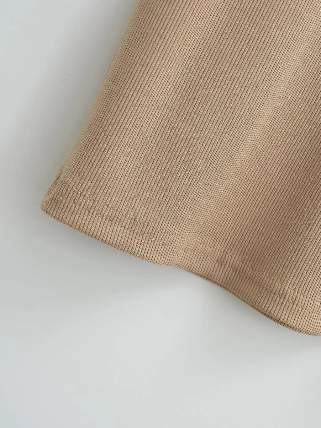 Women’s knit turtleneck bodycon ankle-length maxi dress by The Glow Sanctuary, featuring a fitted silhouette and cozy knit fabric.