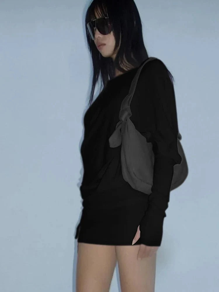 Women's off-shoulder bodycon mini dress with long sleeves and oblique neck, perfect for fall and winter parties, by TrendLux Wear.
